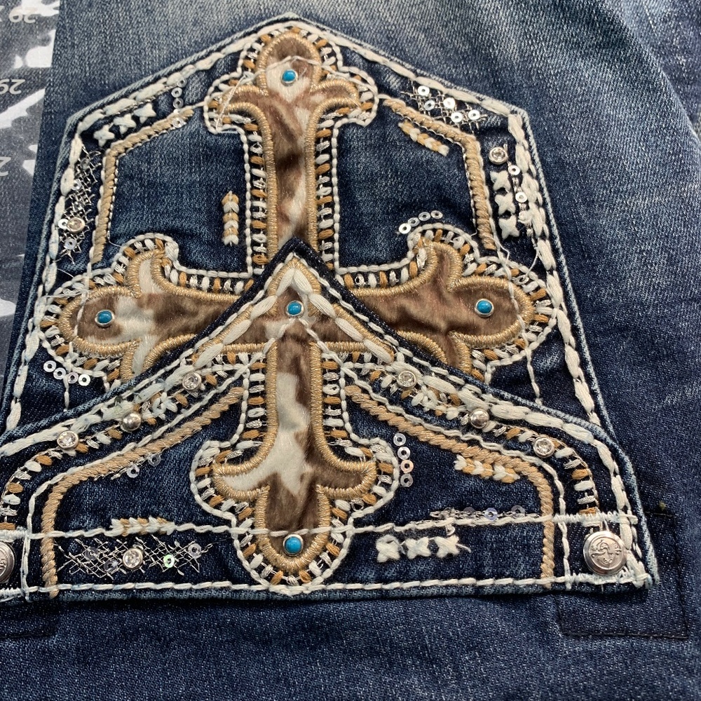 Grace in La bootcut with embellished cross on pocket